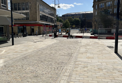 A photo of a town centre featuring city blend sandstone paving, recently completed by BBS
